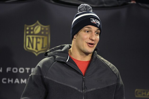 New England Patriots tight end Rob Gronkowski faces reporters before an NFL football practice, Thursday, Jan. 21, 2016, in Foxborough, Mass. The Patriots are to play the Denver Broncos in the AFC Championship on Sunday in Denver. (AP Photo/Steven Senne)