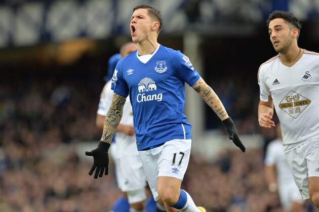 Everton's Bosnian midfielder Muhamed Besic reacts after missing a chance during the English Premier League football match between Everton and Swansea City at Goodison Park in Liverpool, north west England on January 24, 2016. AFP PHOTO / PAUL ELLIS

RESTRICTED TO EDITORIAL USE. No use with unauthorized audio, video, data, fixture lists, club/league logos or 'live' services. Online in-match use limited to 75 images, no video emulation. No use in betting, games or single club/league/player publications. / AFP / PAUL ELLIS        (Photo credit should read PAUL ELLIS/AFP/Getty Images)