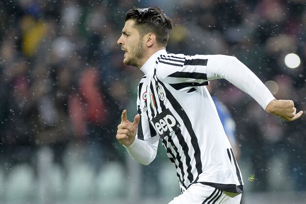 Juventus' Alvaro Morata celebrates after scoring his side's second goal on a penalty kick, during a Serie A soccer match against Inter Milan, at the Juventus stadium, in Turin, Italy, Sunday, Feb. 28, 2016. (AP Photo/Massimo Pinca)