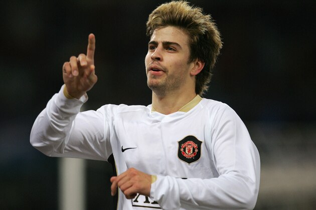 Manchester United's Spanish defender Gerard Pique jubilates after scoring against AS Roma during their UEFA Champions League Group F football match  in Rome's Olympic Stadium 12 December 2007.    AFP PHOTO / FILIPPO MONTEFORTE (Photo credit should read FILIPPO MONTEFORTE/AFP/Getty Images)