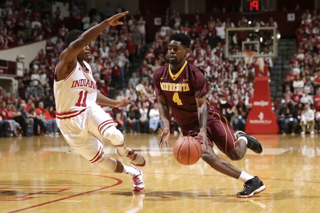 Minnesota guard Kevin Dorsey (4) goes around Indiana guard Kevin Yogi Ferrell (11) in the first half of an NCAA college basketball game in Bloomington, Ind., Saturday, Jan. 30, 2016. (AP Photo/AJ Mast)