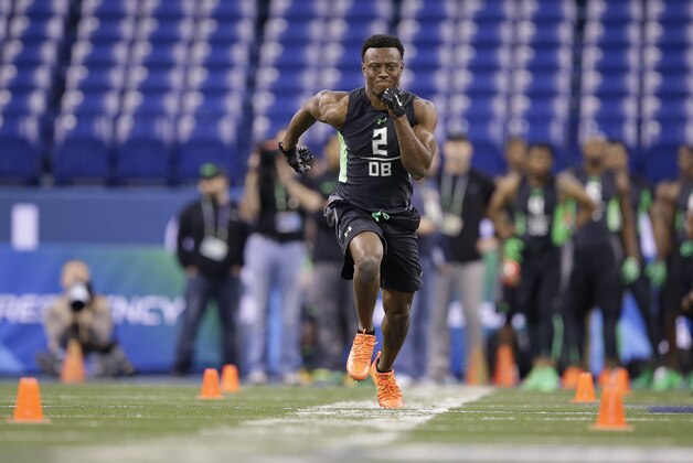 Ohio State defensive back Eli Apple runs a drill at the NFL football scouting combine on Monday, Feb. 29, 2016, in Indianapolis. (AP Photo/Darron Cummings)