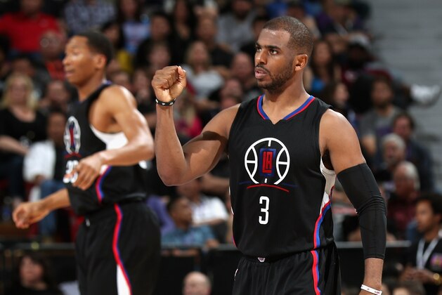 SACRAMENTO, CA - FEBRUARY 26:  Chris Paul #3 of the Los Angeles Clippers reacts after the Clippers made a basket against the Sacramento Kings at Sleep Train Arena on February 26, 2016 in Sacramento, California. NOTE TO USER: User expressly acknowledges and agrees that, by downloading and or using this photograph, User is consenting to the terms and conditions of the Getty Images License Agreement.  (Photo by Ezra Shaw/Getty Images)