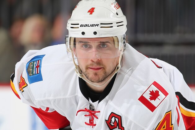 NEWARK, NJ - JANUARY 19:  Kris Russell #4 of the Calgary Flames looks on beforoe a face off against the New Jersey Devils on January 19,2016 at Prudential Center in Newark, New Jersey.  (Photo by Elsa/Getty Images)