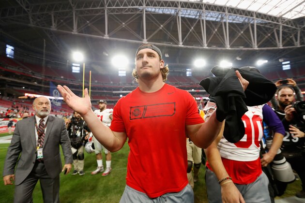 GLENDALE, AZ - JANUARY 01:  Defensive lineman Joey Bosa #97 of the Ohio State Buckeyes reacts as he walks off the field after defeating the Notre Dame Fighting Irish 44-28 in the BattleFrog Fiesta Bowl at University of Phoenix Stadium on January 1, 2016 in Glendale, Arizona.  (Photo by Christian Petersen/Getty Images)