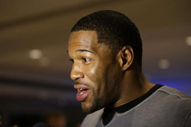 Michael Strahan speaks during an interview at the NFL Super Bowl XLVIII media center, Tuesday, Jan. 28, 2014, in New York. (AP Photo/Matt Slocum)