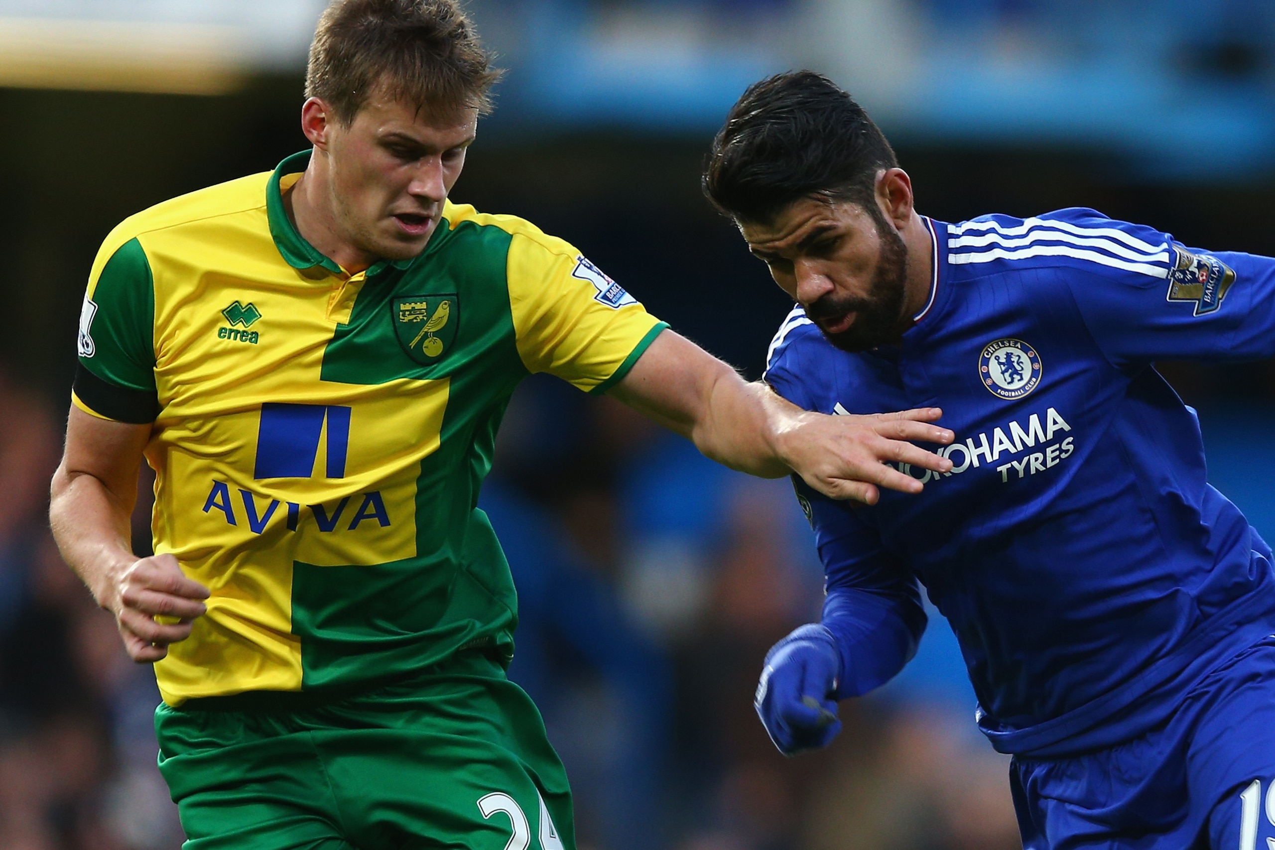 LONDON, ENGLAND - NOVEMBER 21: Diego Costa of Chelsea and Ryan Bennett of Norwich City compete for the ball during the Barclays Premier League match between Chelsea and Norwich City at Stamford Bridge on November 21, 2015 in London, England.  (Photo by Paul Gilham/Getty Images)