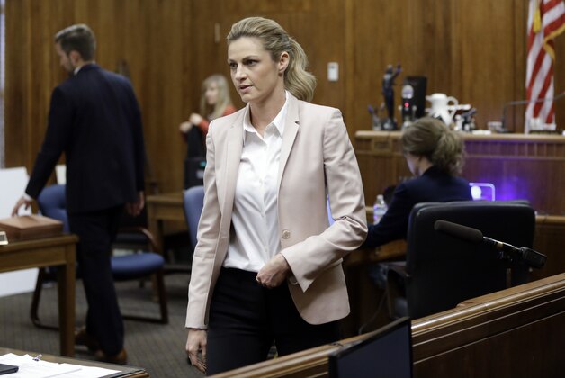Sportscaster and television host Erin Andrews walks back to her seat after giving testimony Tuesday, March 1, 2016, in Nashville, Tenn. Andrews has filed a $75 million lawsuit against the franchise owner and manager of a luxury hotel and a man who admitted to making secret nude recordings of her in 2008. (AP Photo/Mark Humphrey, Pool)
