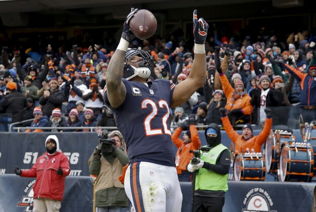 Jan 3, 2016; Chicago, IL, USA; Chicago Bears running back Matt Forte (22) celebrates after scoring a touchdown against the Detroit Lions during the second half at Soldier Field. The Lions won 24-20. Mandatory Credit: Kamil Krzaczynski-USA TODAY Sports