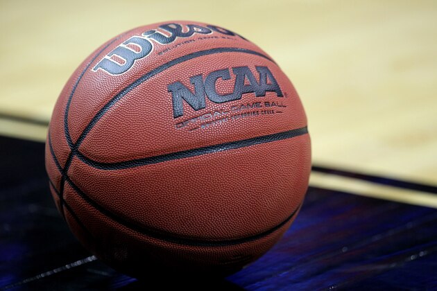 LOUISVILLE, KY - MARCH 15:  A detail of an official NCAA Men's Basketball game ball made by Wilson is seen on the court as the Iowa State Cyclones play against the Connecticut Huskies during the second round of the 2012 NCAA Men's Basketball Tournament at KFC YUM! Center on March 15, 2012 in Louisville, Kentucky.  (Photo by Andy Lyons/Getty Images)