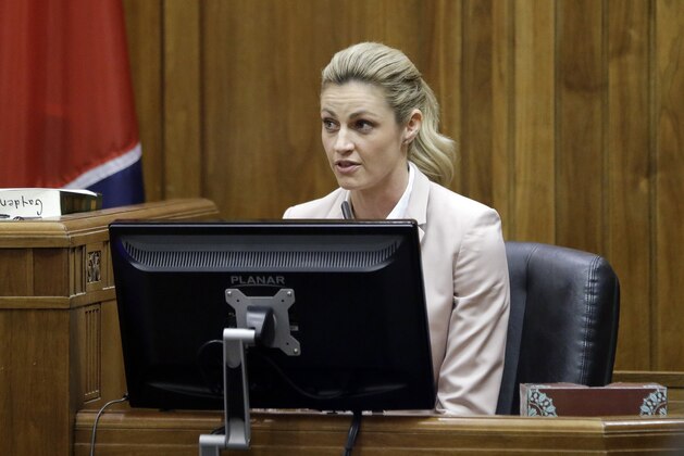 Sportscaster and television host Erin Andrews  is cross-examined Tuesday, March 1, 2016, in Nashville, Tenn. Andrews has filed a $75 million lawsuit against the franchise owner and manager of a luxury hotel and a man who admitted to making secret nude recordings of her in 2008. (AP Photo/Mark Humphrey, Pool)