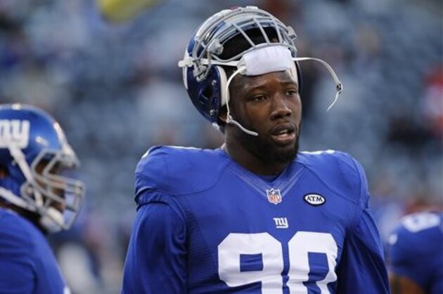 FILE - In this Jan. 3, 2016, file photo, New York Giants defensive end Jason Pierre-Paul (90) warms up before playing against the Philadelphia Eagles in an NFL football game in East Rutherford, N.J. Ben McAdoo's first season as Giants head coach could turn on the recoveries of two key players, Jason Pierre-Paul and Victor Cruz. (AP Photo/Julio Cortez, File)