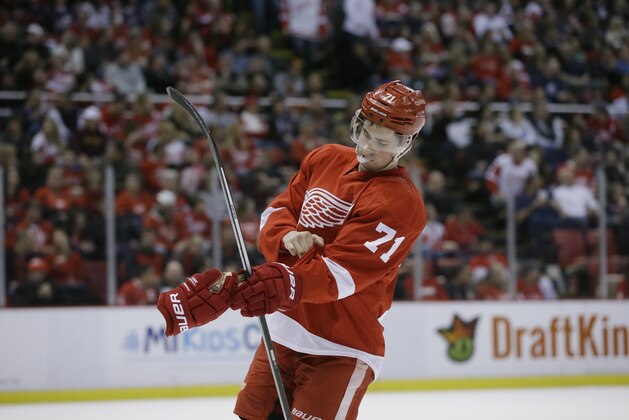 Detroit Red Wings center Dylan Larkin prepares during the first period of an NHL hockey game against the Columbus Blue Jackets, Tuesday, Feb. 23, 2016, in Detroit. (AP Photo/Carlos Osorio)