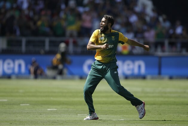 South Africa’s bowler Imran Tahir, celebrates after dismissing England’s batsman Joe Root,  for 34 runs during the second and the final T20 cricket match between South Africa and England at the Wanderers Stadium in Johannesburg, South Africa, Sunday, Feb. 21, 2016. (AP Photo/Themba Hadebe)
