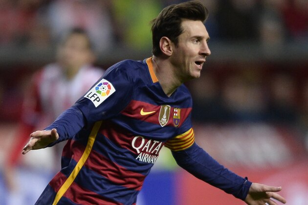 Barcelona's Argentinian forward Lionel Messi celebrates after scoring a goal during the Spanish league football match Real Sporting de Gijon vs FC Barcelona at El Molinon stadium in Gijonon 2016.  AFP PHOTO / MIGUEL RIOPA / AFP / MIGUEL RIOPA        (Photo credit should read MIGUEL RIOPA/AFP/Getty Images)
