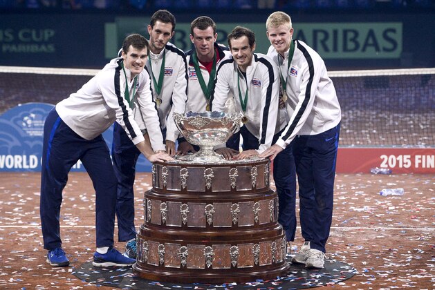 (From L) Britain's Jamie Murray, Britain's James Ward, Britain's captain Leon Smith, Britain's Andy Murray and Britain's Kyle Edmund pose with the trophy after winning the Davis Cup tennis final against Belgium at Flanders Expo in Ghent on November 29, 2015. Britain won the Davis Cup for the first time in 79 years in Ghent on Sunday when Andy Murray defeated David Goffin 6-3, 7-5, 6-3, in the first of the reverse singles for an unbeatable 3-1 lead over Belgium. AFP PHOTO / BELGA / DIRK WAEM 

--BELGIUM OUT-- / AFP / BELGA / DIRK WAEM        (Photo credit should read DIRK WAEM/AFP/Getty Images)