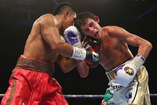 MANCHESTER, ENGLAND - FEBRUARY 27:  Gavin McDonnell connects with Jorge Sanchez during his victory in the Vacant WBC Silver & Eliminator Super-Bantamweight Championship at Manchester Arena on February 27, 2016 in Manchester, England.  (Photo by Alex Livesey/Getty Images)