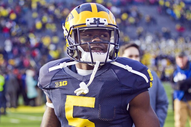 Michigan defensive back Jabrill Peppers (5) walk off the field after an NCAA college football game against Ohio State in Ann Arbor, Mich., Saturday, Nov. 28, 2015. Ohio State won 42-13. (AP Photo/Tony Ding)