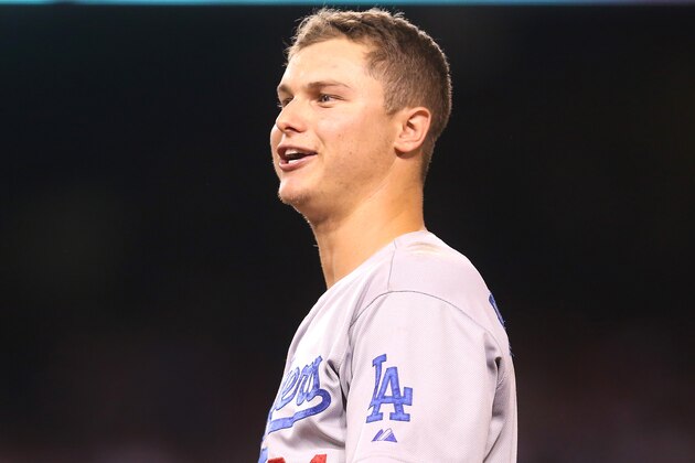 ANAHEIM, CA - SEPTEMBER 07: Base runner Joc Pederson #31 of the Los Angeles Dodgers jokes with teammates as he waits on first during a pitching change in the game against the Los Angeles Angels of Anaheim at Angel Stadium of Anaheim on September 7, 2015 in Anaheim, California.  (Photo by Stephen Dunn/Getty Images)