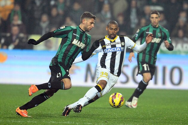 REGGIO NELL'EMILIA, ITALY - JANUARY 10: Domencio Berardi # 25 of US Sassuolo Calcio ( L ) competes the ball with Gabriel Silva # 34 of Udinese Calcio ( R ) in action during the Serire A match between US Sassuolo Calcio and Udinese Calcio on January 10, 2015 in Reggio nell'Emilia, Italy.  (Photo by Mario Carlini / Iguana Press/Getty Images)