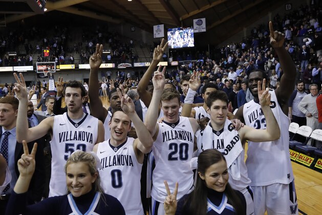 Villanova players celebrate after an NCAA college basketball game against DePaul, Tuesday, March 1, 2016, in Philadelphia. (AP Photo/Matt Slocum)