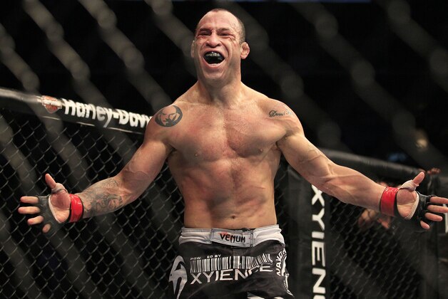Wanderlei Silva, from Brazil, celebrates after beating Cung Le during the second round of a UFC 139 Mixed Martial Arts middleweight bout in San Jose, Calif., Saturday, Nov. 19, 2011. Silva won by TKO in the second round. (AP Photo/Jeff Chiu)