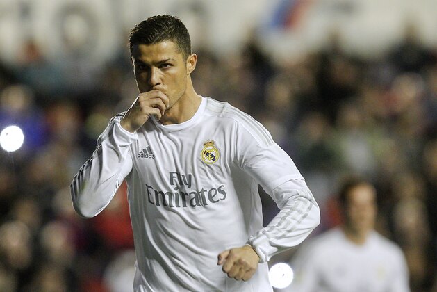 Real Madrid's Portuguese forward Cristiano Ronaldo celebrates a goal during the Spanish league football match Levante UD vs Real Madrid CF at the Ciutat de Valencia stadium in Valencia on March 2, 2016. / AFP / Jose Jordan (Photo credit should read JOSE JORDAN/AFP/Getty Images) Real Madrid's Portuguese forward Cristiano Ronaldo celebrates a goal during the Spanish league football match Levante UD vs Real Madrid CF at the Ciutat de Valencia stadium in Valencia on March 2, 2016. / AFP / Jose Jordan (Photo credit should read JOSE JORDAN/AFP/Getty Images)