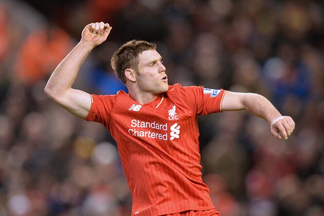 Liverpool's English midfielder James Milner celebrates after scoring their second goal during the English Premier League football match between Liverpool and Manchester City at Anfield in Liverpool, north west England on March 2, 2016. / AFP / Paul ELLIS / RESTRICTED TO EDITORIAL USE. No use with unauthorized audio, video, data, fixture lists, club/league logos or 'live' services. Online in-match use limited to 75 images, no video emulation. No use in betting, games or single club/league/player publications.  /         (Photo credit should read PAUL ELLIS/AFP/Getty Images)