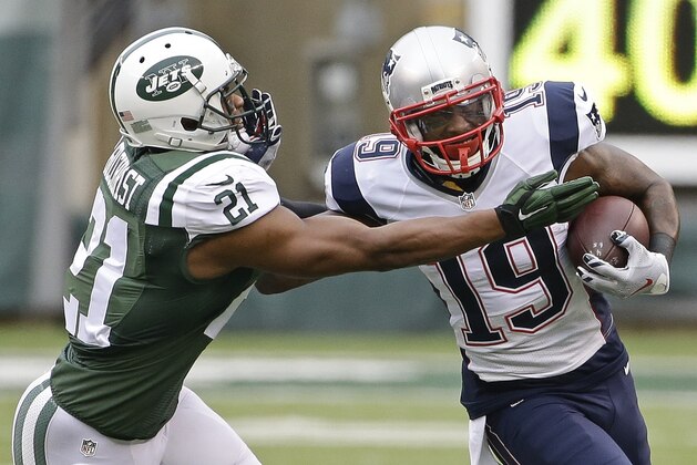 New York Jets free safety Marcus Gilchrist (21) tackles New England Patriots' Brandon LaFell (19) during the first half of an NFL football game Sunday, Dec. 27, 2015, in East Rutherford, N.J. (AP Photo/Seth Wenig)