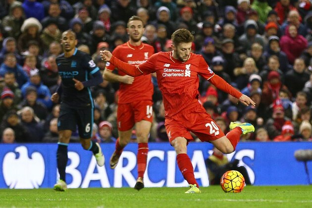 LIVERPOOL, ENGLAND - MARCH 02: Adam Lallana of Liverpool scores the opening goal during the Barclays Premier League match between Liverpool and Manchester City at Anfield on March 2, 2016 in Liverpool, England.  (Photo by Clive Brunskill/Getty Images)