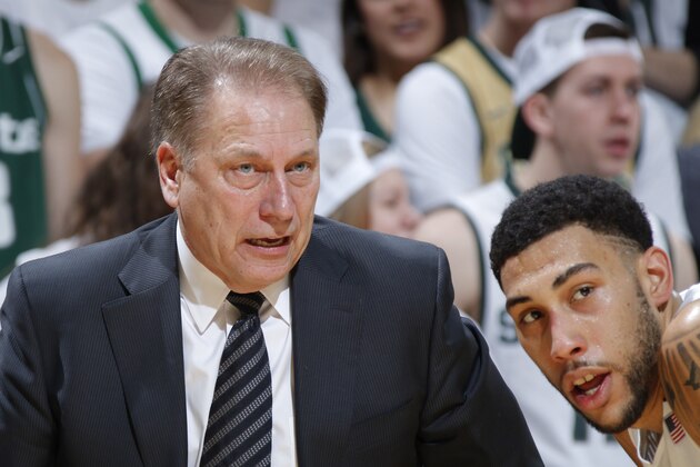 Michigan State coach Tom Izzo, left, talks with Denzel Valentine during the second half of an NCAA college basketball game against Indiana, Sunday, Feb. 14, 2016, in East Lansing, Mich. Michigan State won 88-69. (AP Photo/Al Goldis)