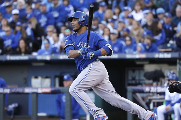 Toronto Blue Jays' Edwin Encarnacion watches his RBI single against the Kansas City Royals during the sixth inning in Game 2 of baseball's American League Championship Series on Saturday, Oct. 17, 2015, in Kansas City, Mo. (AP Photo/Matt Slocum)