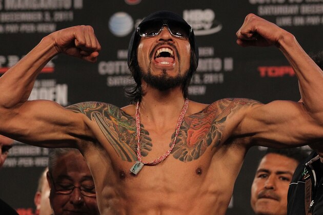NEW YORK, NY - DECEMBER 02:  Antonio Margarito of Mexico flexes as he takes the scale for his bout with Miguel Cotto of Puerto Rico during their weigh in at The Theater at Madison Square Garden on December 2, 2011 in New York City.  (Photo by Nick Laham/Getty Images)