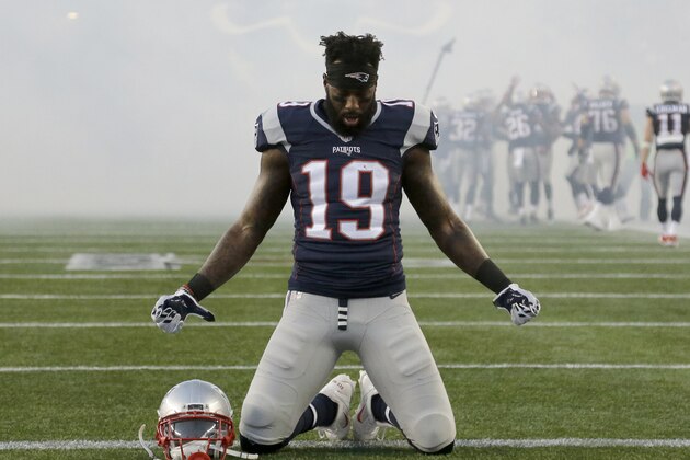 New England Patriots wide receiver Brandon LaFell kneels before an NFL divisional playoff football game against the Kansas City Chiefs, Saturday, Jan. 16, 2016, in Foxborough, Mass. (AP Photo/Elise Amendola)