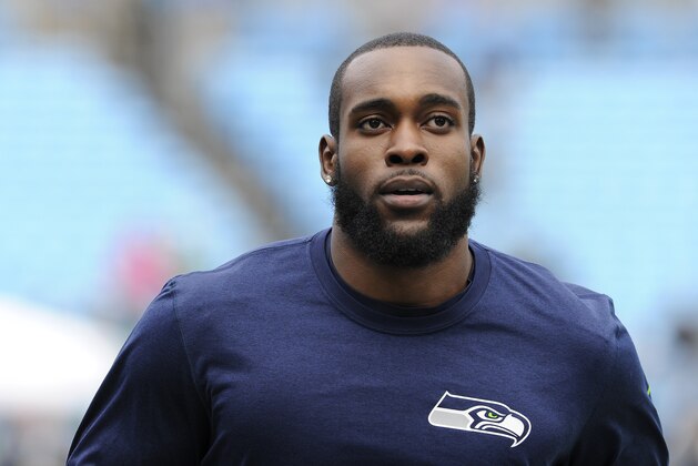 Seattle Seahawks strong safety Kam Chancellor warms up before the first half of an NFL divisional playoff football game between the Carolina Panthers and the Seattle Seahawks, Sunday, Jan. 17, 2016, in Charlotte, N.C. (AP Photo/Mike McCarn)
