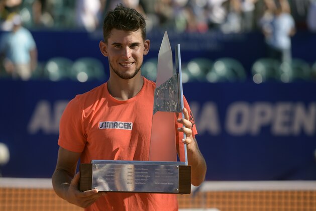 Austria's Dominic Thiem poses with his trophy after defeating Spain's Nicolas Almagro 6-7, 6-3, 7-6  during the ATP Argentina Open in Buenos Aires, Argentina, on February 14, 2016. AFP PHOTO/EITAN ABRAMOVICH / AFP / EITAN ABRAMOVICH        (Photo credit should read EITAN ABRAMOVICH/AFP/Getty Images)