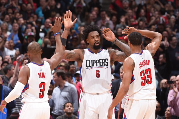 LOS ANGELES, CA - MARCH 2: DeAndre Jordan #6 high fives teammates Chris Paul #3 and Wesley Johnson #33 of the Los Angeles Clippers during the game against the Oklahoma City Thunder on March 2, 2016 at STAPLES Center in Los Angeles, California. NOTE TO USER: User expressly acknowledges and agrees that, by downloading and or using this Photograph, user is consenting to the terms and conditions of the Getty Images License Agreement. Mandatory Copyright Notice: Copyright 2016 NBAE (Photo by Andrew Bernstein/NBAE via Getty Images) LOS ANGELES, CA - MARCH 2: DeAndre Jordan #6 high fives teammates Chris Paul #3 and Wesley Johnson #33 of the Los Angeles Clippers during the game against the Oklahoma City Thunder on March 2, 2016 at STAPLES Center in Los Angeles, California. NOTE TO USER: User expressly acknowledges and agrees that, by downloading and or using this Photograph, user is consenting to the terms and conditions of the Getty Images License Agreement. Mandatory Copyright Notice: Copyright 2016 NBAE (Photo by Andrew Bernstein/NBAE via Getty Images)