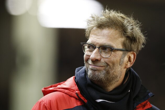 Liverpool's manager Juergen Klopp smiles before the English Premier League soccer match between Liverpool and Manchester City at Anfield Stadium, Liverpool, England, Wednesday, March 2, 2016. (AP Photo/Jon Super)