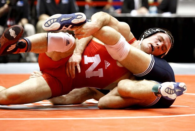 Mar 8, 2015; Columbus, OH, USA; Robert Kokesh of Nebraska (top) wrestles Matt Brown of Penn State in the 174 pound division as part of the Big Ten Championships at St. John Arena. Mandatory Credit: Joe Maiorana-USA TODAY Sports