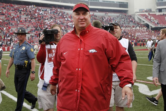 Arkansas' Bret Bielema walks off the field after overtime of an NCAA college football game against Auburn, Saturday, Oct. 24, 2015, in Fayetteville, Ark. Arkansas won 54-46 in four overtimes. (AP Photo/Samantha Baker)