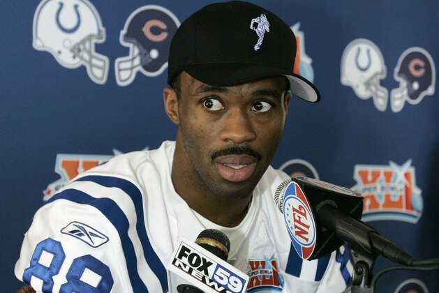 Indianapolis Colts wide receiver Marvin Harrison answers a question during an availability at the team's hotel  in Ft. Lauderdale , Fla. Wednesday, Jan. 31, 2007. The Colts face the Chicago Bears in Super Bowl XLI in Miami on Sunday, Feb. 4. . (AP Photo/Michael Conroy)