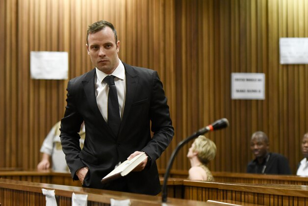 Oscar Pistorius arrives at a courtroom of the North Gauteng High Court in Pretoria, South Africa, Tuesday Dec. 8, 2015. Pistorius arrived in the South African courtroom, where he is expected to apply for bail following his conviction for murdering girlfriend Reeva Steenkamp. (AP Photo/Herman Verwey, Pool)