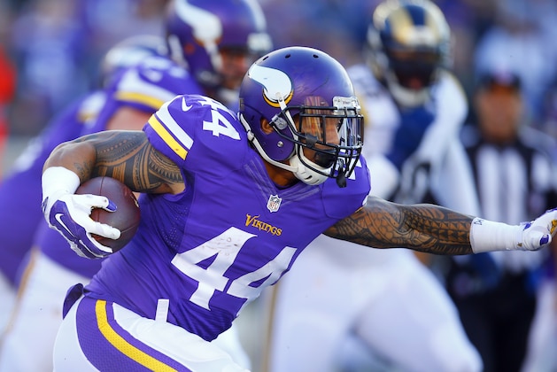 Minnesota Vikings running back Matt Asiata (44) runs the ball against the St. Louis Rams during an NFL football game Sunday, Nov. 8, 2015, in Minneapolis. The Vikings won in overtime, 21-18.  (Jeff Haynes/AP Images for Panini)