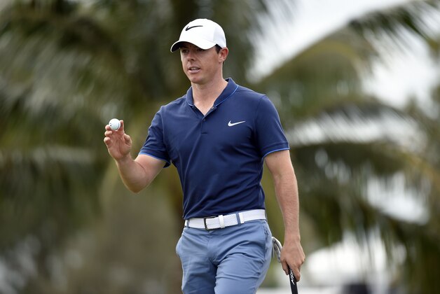 Mar 3, 2016; Miami, FL, USA; Rory Mcilroy waves to the gallery after putting out on the 10th green during first round of the Cadillac Championship at TPC Blue Monster at Trump National Doral. Mandatory Credit: John David Mercer-USA TODAY Sports