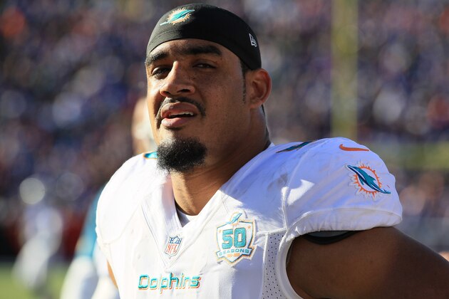 ORCHARD PARK, NY - NOVEMBER 8:  Koa Misi #55 of the Miami Dolphins watches from the sidelines during a game against the Buffalo Bills at Ralph Wilson Stadium on November 8, 2015 in Orchard Park, New York. (Photo by Jerome Davis/Getty Images)