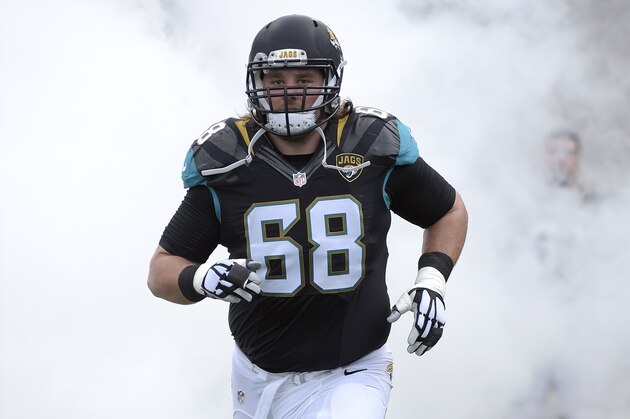 Jacksonville Jaguars guard Zane Beadles (68) runs onto the field during player introductions before an NFL football game against the Indianapolis Colts in Jacksonville, Fla., Sunday, Dec. 13, 2015. (AP Photo/Phelan M. Ebenhack)