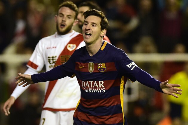 Barcelona's Argentinian forward Lionel Messi celebrates after scoring during the Spanish league football match CF Rayo Vallecano vs FC Barcelona at the Vallecas stadium in Madrid on March 3, 2016. / AFP / PIERRE-PHILIPPE MARCOU        (Photo credit should read PIERRE-PHILIPPE MARCOU/AFP/Getty Images)