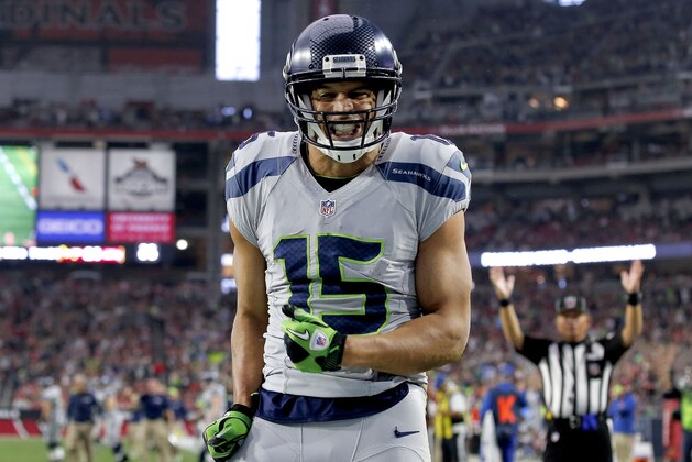 Seattle Seahawks wide receiver Jermaine Kearse (15) celebrates his touchdown against the Arizona Cardinals during the first half of an NFL football game, Sunday, Jan. 3, 2016, in Glendale, Ariz. (AP Photo/Ross D. Franklin)