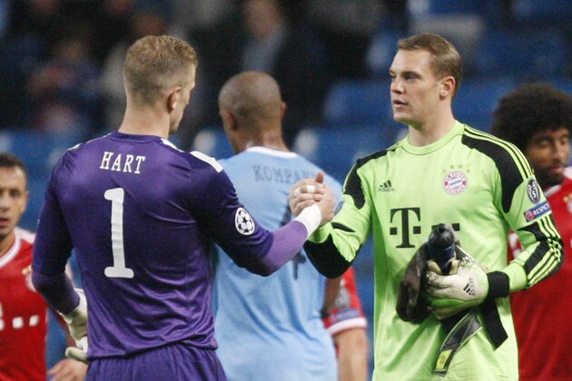 Manchester City's goalkeeper Joe Hart, left, shakes hand with Bayern goalkeeper Manuel Neuer after the Champions League group D soccer match between Manchester City and Bayern Munich at the Etihad Stadium in Manchester, England, Wednesday, Oct. 2, 2013. (AP Photo/Jon Super)