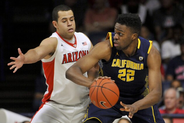 Mar 3, 2016; Tucson, AZ, USA; Arizona Wildcats forward Ryan Anderson (12) defends California Golden Bears center Kingsley Okoroh (22) during the first half at McKale Center. Mandatory Credit: Casey Sapio-USA TODAY Sports